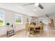 Dining area with ample natural light and views, with a bar cart for convenience at 123 Annapolis Ln, Rotonda West, FL 33947