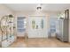Open foyer featuring neutral walls, tile flooring, and stylish decor creating a welcoming ambiance at 123 Annapolis Ln, Rotonda West, FL 33947