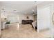 Spacious living room boasts tile flooring, open layout, and modern furnishings for comfortable living at 123 Annapolis Ln, Rotonda West, FL 33947