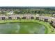 Back view of property with water views at 12425 Ghiberti Cir # 101, Venice, FL 34293