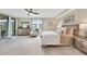 Spacious main bedroom featuring lots of natural light and a ceiling fan at 12425 Ghiberti Cir # 101, Venice, FL 34293
