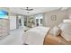 Bright main bedroom featuring lots of space and a ceiling fan at 12425 Ghiberti Cir # 101, Venice, FL 34293