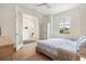 Bedroom featuring french doors and tile flooring at 14684 Cherry Blossom Way, Punta Gorda, FL 33955