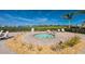 Relaxing community hot tub with golf course views offers the perfect spot to unwind and enjoy the scenery at 14684 Cherry Blossom Way, Punta Gorda, FL 33955