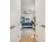 View from the doorway of a spacious main bedroom with ensuite bathroom and access to the pool area at 14684 Cherry Blossom Way, Punta Gorda, FL 33955