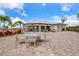 The community restaurant offers outdoor seating, beautiful views, and a relaxed atmosphere for residents at 14684 Cherry Blossom Way, Punta Gorda, FL 33955