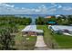 Charming waterfront home with a well-maintained yard, carport, and serene water views at 161 Danforth Dr, Punta Gorda, FL 33980