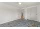Spacious bedroom featuring tile flooring and access to other rooms at 161 Danforth Dr, Punta Gorda, FL 33980