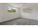 Well-lit bedroom with tile flooring and large windows for natural light at 161 Danforth Dr, Punta Gorda, FL 33980