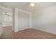 Bedroom with tile flooring, ceiling fan, a window, and closet, offering ample space and storage at 161 Danforth Dr, Punta Gorda, FL 33980