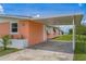Home exterior with covered parking and well-kept yard at 161 Danforth Dr, Punta Gorda, FL 33980