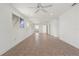 Spacious living room featuring tile flooring, recessed lighting, and a ceiling fan at 161 Danforth Dr, Punta Gorda, FL 33980