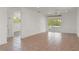 Bright and airy living room with sliding glass doors to a screened lanai at 161 Danforth Dr, Punta Gorda, FL 33980
