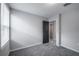 Bedroom featuring carpeted floors and a window bringing in natural light at 17032 Yellow Pine St, Wimauma, FL 33598