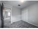 Bedroom featuring carpeted floors, closet and window bringing in natural light at 17032 Yellow Pine St, Wimauma, FL 33598