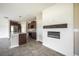 Open kitchen featuring stainless steel appliances, granite countertops, and center island at 17032 Yellow Pine St, Wimauma, FL 33598