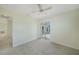 Bright bedroom with sliding glass doors leading to outdoor pool area at 1915 Pebble Beach Ct, Venice, FL 34293