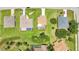 This aerial view shows large properties with inviting pools and lush landscaping at 200 Valdiva St, Punta Gorda, FL 33983