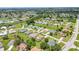 Wide aerial shot displaying an abundance of houses in a vibrant community at 200 Valdiva St, Punta Gorda, FL 33983