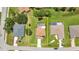 An aerial view of the property shows the lawn, landscaping, and the pool in the backyard at 200 Valdiva St, Punta Gorda, FL 33983