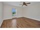 Bright room features hardwood floors, a window and a ceiling fan at 200 Valdiva St, Punta Gorda, FL 33983