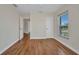 A bedroom with hardwood floors, bright windows and modern trim at 200 Valdiva St, Punta Gorda, FL 33983