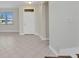 Inviting foyer boasts neutral tile flooring, enhancing the entryway's bright and open feel at 200 Valdiva St, Punta Gorda, FL 33983