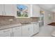 Beautiful kitchen with granite countertops and an outdoor view at 200 Valdiva St, Punta Gorda, FL 33983