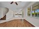 Spacious living area showcases an open layout with hardwood floors and seamless access to the kitchen at 200 Valdiva St, Punta Gorda, FL 33983