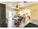 Open floor plan with dining area and view into kitchen area at 20409 Emerald Ave, Port Charlotte, FL 33952