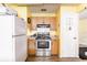 Kitchen with stainless steel appliances and wood floors at 20409 Emerald Ave, Port Charlotte, FL 33952