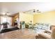 Open floor plan with living room, dining area, and tile floors at 20409 Emerald Ave, Port Charlotte, FL 33952