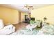 Open floor plan with living room, dining area, and tile floors at 20409 Emerald Ave, Port Charlotte, FL 33952