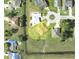 Aerial view of the property showing property lines, lot size, and surrounding neighborhood features at 214 Castile Ct, Punta Gorda, FL 33983