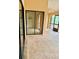Sunroom with sliding glass doors and tiled floors at 214 Castile Ct, Punta Gorda, FL 33983