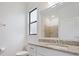 Granite counters accent this well-lit bathroom with tiled shower at 2161 Gardenia Ave, Port Charlotte, FL 33953