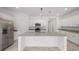 Modern kitchen featuring stainless steel appliances and a large island with granite countertops at 2161 Gardenia Ave, Port Charlotte, FL 33953