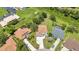Aerial view of home showcasing layout, landscaping, and nearby residences at 2210 Mauritania Rd, Punta Gorda, FL 33983