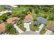 Aerial view of home showing large lot, driveway, landscaping and neighboring houses at 2210 Mauritania Rd, Punta Gorda, FL 33983