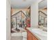 Bathroom with decorative shower curtain, a single sink vanity, and neutral color scheme at 2210 Mauritania Rd, Punta Gorda, FL 33983