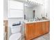 Bathroom with dual sink vanity, tiled floors, and a window at 2210 Mauritania Rd, Punta Gorda, FL 33983