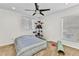 Bedroom with neutral carpet, ceiling fan, and natural lighting at 2210 Mauritania Rd, Punta Gorda, FL 33983