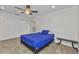 Bedroom with carpet floors, ceiling fan, and a double door closet at 2210 Mauritania Rd, Punta Gorda, FL 33983