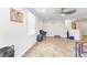 Bonus room featuring neutral tile floors, natural light, and versatile space at 2210 Mauritania Rd, Punta Gorda, FL 33983