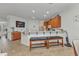 Kitchen offers wood cabinetry, a breakfast bar with seating and stainless steel appliances at 2210 Mauritania Rd, Punta Gorda, FL 33983
