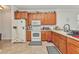 Kitchen features wood cabinetry, plenty of counter space and stainless steel appliances at 2210 Mauritania Rd, Punta Gorda, FL 33983