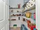 Pantry with wire shelves, organized food items, and ample storage space at 2210 Mauritania Rd, Punta Gorda, FL 33983