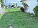 Overgrown backyard space with partial fence at 22187 Lasalle Rd, Port Charlotte, FL 33952