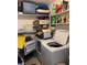 Crowded laundry room with a washer and dryer and shelves at 22187 Lasalle Rd, Port Charlotte, FL 33952