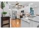 Modern kitchen with stainless steel appliances, granite countertops, and ample cabinet space at 233 Durrance St, Punta Gorda, FL 33950